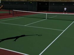 WS, Two young men playing tennis, Santa Barbara, California, USA Stock Footage