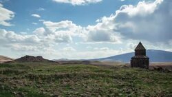 Time-lapse of old Armenian church ruin in Eastern Anatolian landscape with clouds passing by. Stock Footage