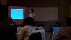 MS, PAN, Man giving presentation in conference room Stock Footage