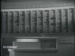 1963: NEW YORK STOCK EXCHANGE: Names in long columns on wall of companies listed on NYSE. Instructional Video