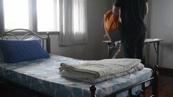 Young man traveler in the hostel Stock Footage