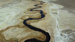 Aerial landscape of the Upper Owens River winding through the Long Valley Caldera, in Mono County, California. Stock Footage