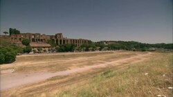 A clear sky outlines the crumbling roofline of Circus Maximus in Rome, Italy. Stock Footage