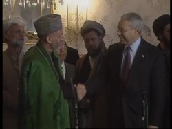 APTN cover of Powell and Karzai presser News Clip