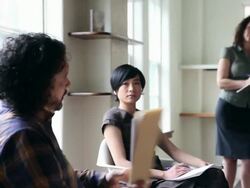 PAN MS R/F three coworkers in discussion in office/Seattle, Washington, USA Stock Footage