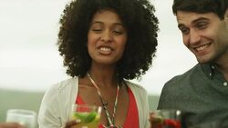 Friends toasting cocktails outdoors Stock Footage