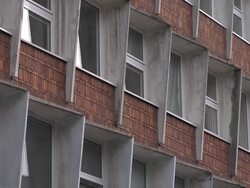 C/U windows of ugly communist era building Stock Footage