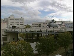 Helicopter arrives at hospital, Arafat moved on stretcher News Clip