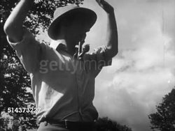 1952: CANADA: PEOPLE: VS Canadian men, worker smiling, man w/ fancy pipe in mouth standing w/ hands on hips, man w/ plain pipe holding pole, VS Businessmen in conference room meeting. Immigrant, immigration, native, manual labor, business, work fo Instructional Video