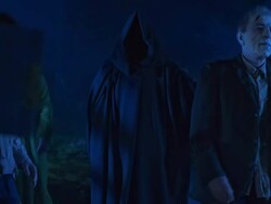 HD: Grim Reaper Watching Over The Deceased Stock Footage