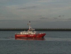 WS View of ferry at entrance of port / Ostend, Flanders, Belgium Stock Footage
