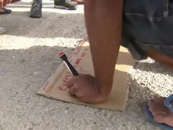 Refugees and migrants at a detention centre News Clip