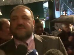 INTERVIEW: Joel Silver and Lionel Wigram on Robert Downey Jr. and Jude Law, the 3rd film, making films in the UK at the Sherlock Holmes: A Game Of Shadows: European Premiere at Empire Leicester Square on December 08, 2011 in London, England  Stock Footage