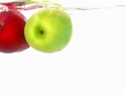 apples falling into the water Stock Footage