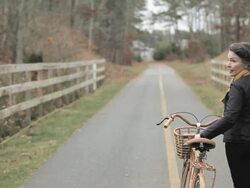 Mature couple walking with bicycles Stock Footage