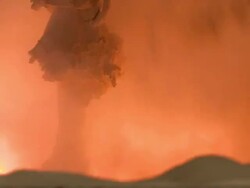 Medium Close Up static - Flames and smoke rise as raw materials cook in a furnace /  Kansas, United States Stock Footage