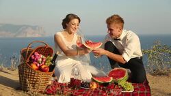 Wedding picnic on the coast Stock Footage
