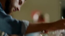 Bartender pours mixed cocktail drink into glass Stock Footage