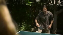 m/s of guy playing ping pong laughing Stock Footage