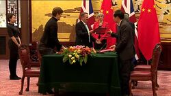 Theresa May meets for trade cooperation talks with Li Keqiang in Beijing News Clip