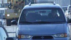 An SUV weaves through heavy traffic. Stock Footage