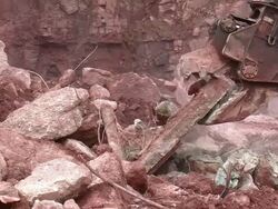 MS Demolition of crushing machine at quarry by bulldozer / Taben-Rodt, Rhineland-Palatinate, Germany Stock Footage