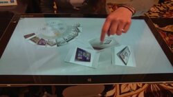 The hi-tech table top that interacts with your smartphone News Clip