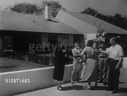 1949: THE SUBURBS: AERIAL XWS Planned tract housing neighborhood community w/ road FG, TD WS Rows of houses in blocks divided by streets.   Postwar, suburb, Baby Boom, Lifestyle, affordable, inexpensive, similar to Levittown, PA. Instructional Video