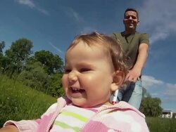 HD SLOW-MOTION: Child Riding A Bike Stock Footage