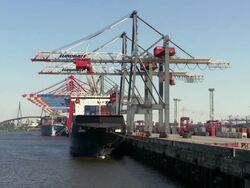 WS View of unloading containers in container ship on container terminal in harbour / Hamburg, Germany Stock Footage