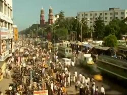 T/L WA High angle view of Traffic and people moving through Indian city street, Madras Stock Footage