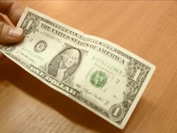 Hand gives dollar to another man - time lapse, NTSC Stock Footage