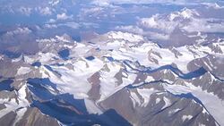 Aerial view of the Himalayas mountain range from the airplane window Stock Footage