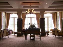 Traditional hotel lounge, old fashioned chairs and piano, Lough Erne, Northern Ireland Stock Footage