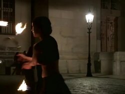 MS PAN Female fire dancer dancing with flaming hula hoop in front of Frauenkirche in Dresden at night / Dresden, Saxony, Germany Stock Footage