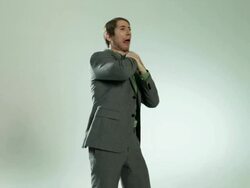 Businessman strangling himself Stock Footage