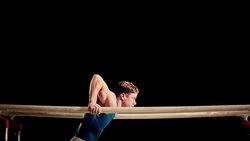SLO MO Gymnast doing a routine on parallel bars Stock Footage