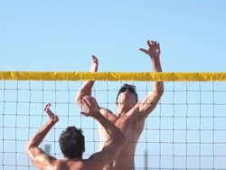 Men playing beach volleyball. - Slow Motion - filmed at 240 fps Stock Footage