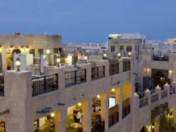 WS PAN T/L  View of restored Souq Waqif with mud rendered shops at night / Doha, Qatar Stock Footage