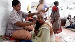 CLEAN : Hair for the Gods ends up on thinning heads in Europe Africa News Clip