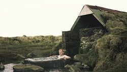 Man swimming in the hot spring Stock Footage