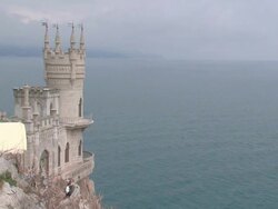 fairytale castle on a cliff above the sea Stock Footage