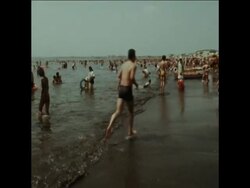 SYND 10-8-70 CHILDREN PLAYING ON OIL POLLUTED BEACHES News Clip