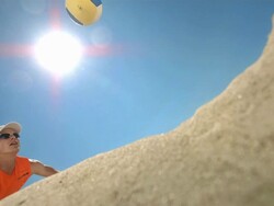 HD Super Slow-Mo: Beach Volleyball Player Digging Ball Stock Footage