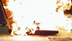 SLO MO Laptop on fire struck by a hammer Stock Footage