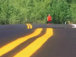 Man runs on road Stock Footage
