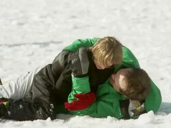 Father and son wrestle Stock Footage