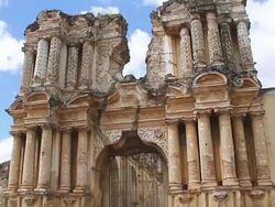 MS LA TD Shot of Oldest gate with sellers / Antigua, Guatemala Stock Footage