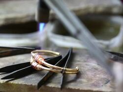 Goldsmith Jeweler decorating gold Stock Footage