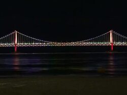 MS T/L Shot of gwangandaegyo Bridge at night / Busan, South Korea Stock Footage